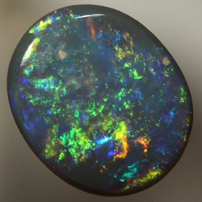 SOLID BLACK OPAL Bright fire. Pinfire pattern.